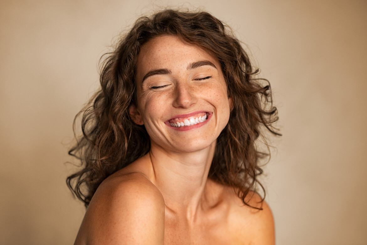 Natural beauty woman laughing with joy
